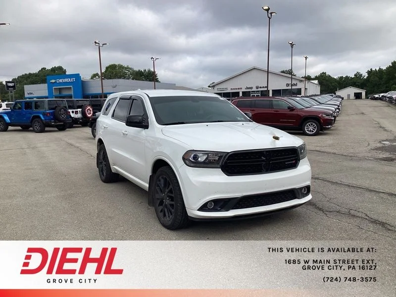 Used 2015 White Dodge SXT image 1