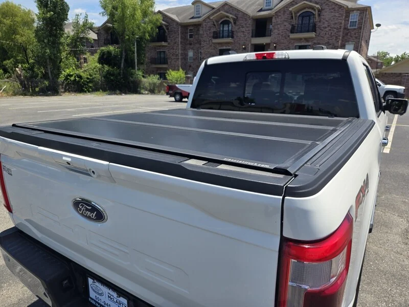 Used 2022 White Metallic FORD LARIAT 4WD SUPERCREW 5.5