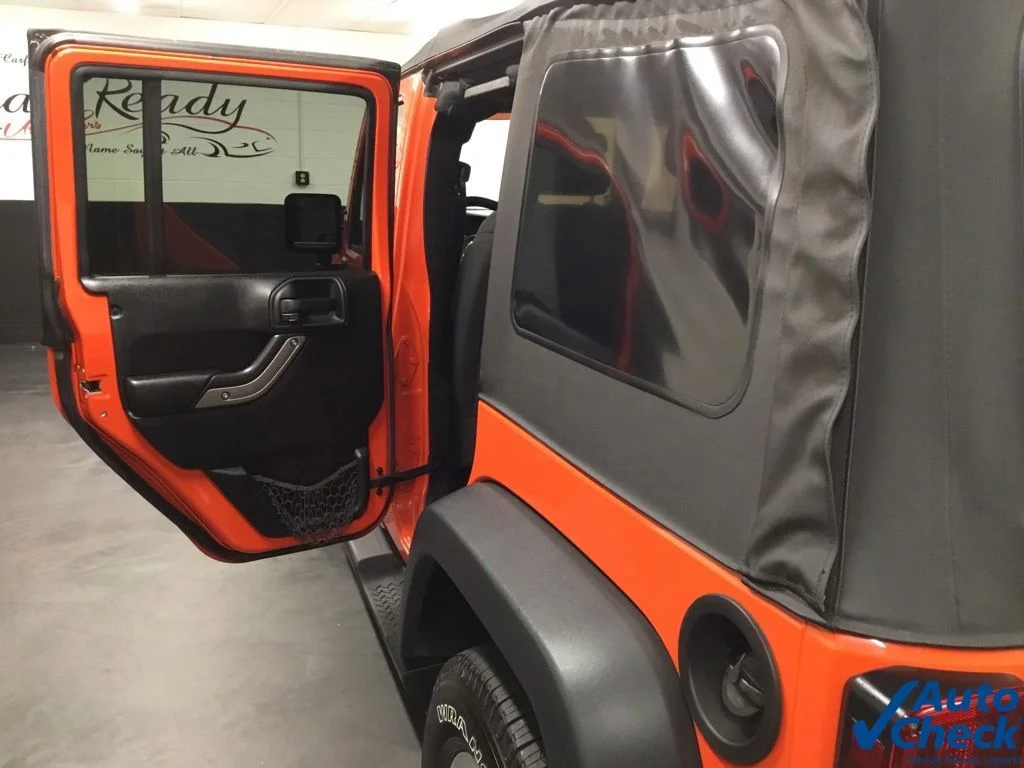 Used 2015 Orange Jeep Unlimited Sport image 29