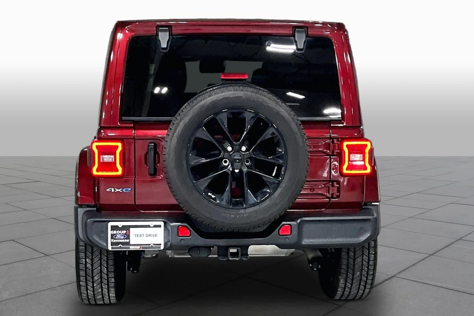 Used 2021 Snazzberry Pearlcoat Jeep Unlimited Sahara image 5