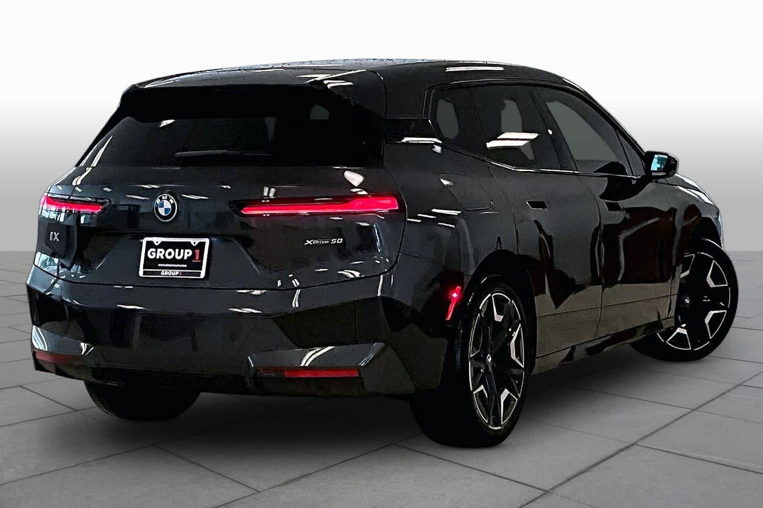 Used 2024 Dark Graphite Metallic BMW xDrive50 image 12