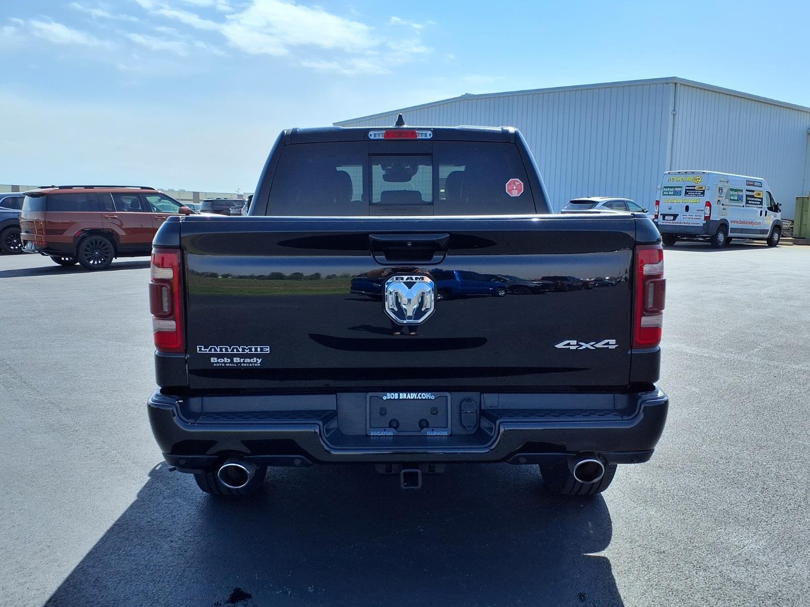 Used 2023 Diamond Black Crystal Pearl Coat RAM Laramie image 14