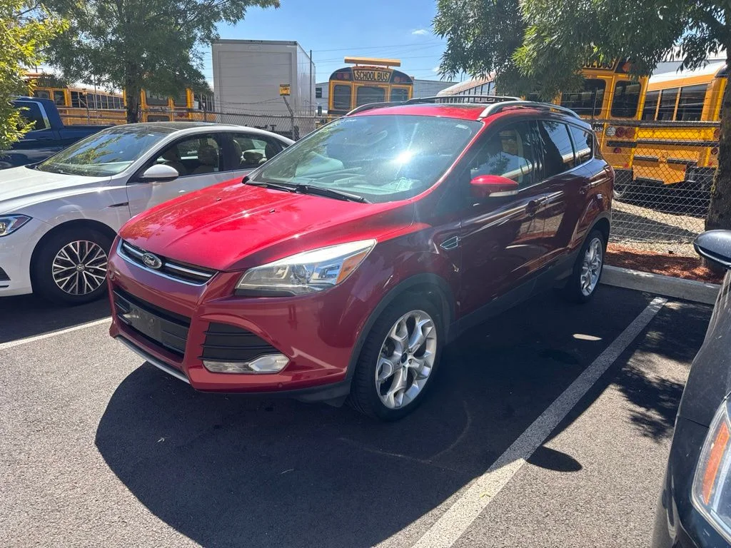 Used 2013 Red Ford Titanium image 1