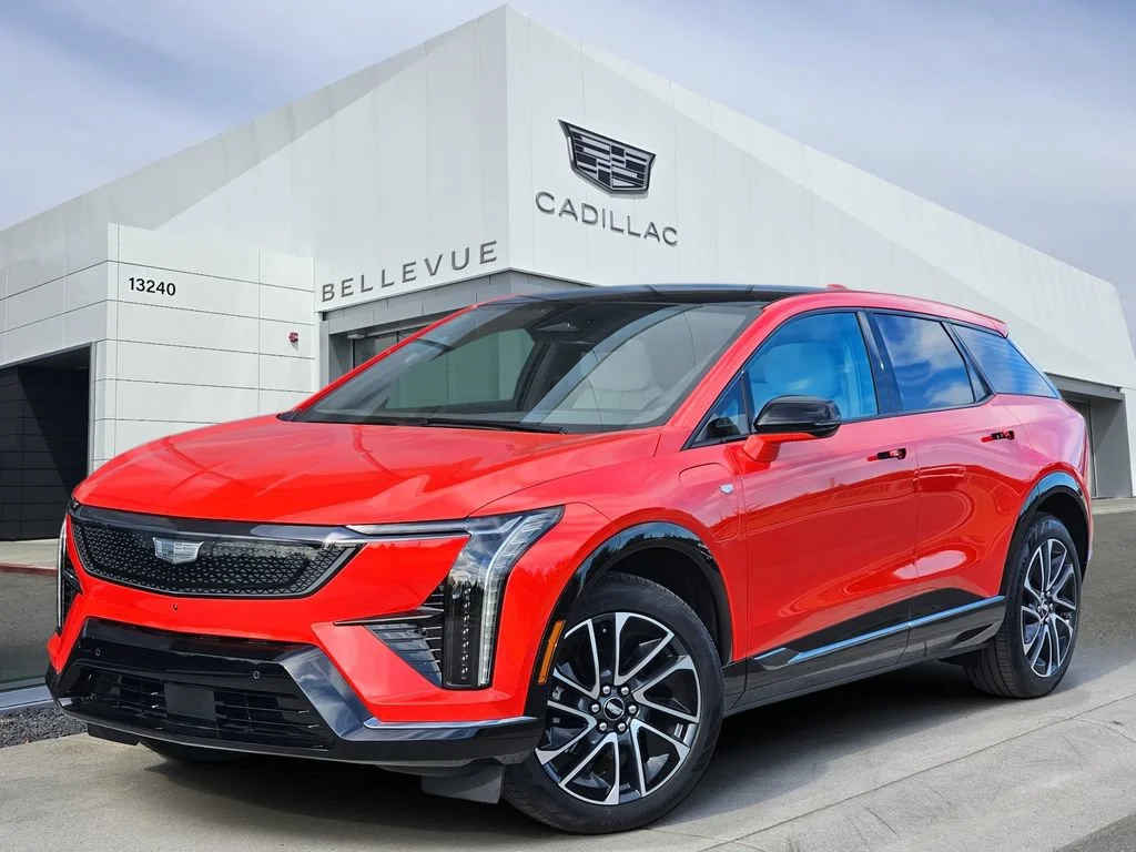 New 2026 Monarch Orange Cadillac Premium Sport image 1