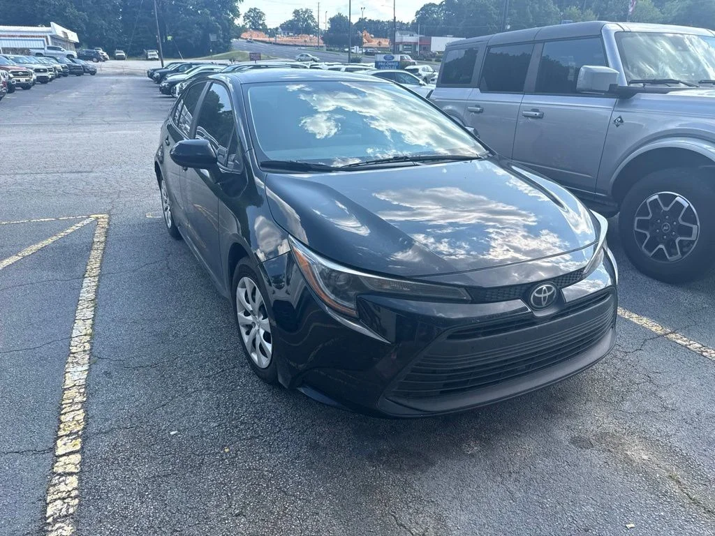 Used 2024 Black Toyota LE image 2