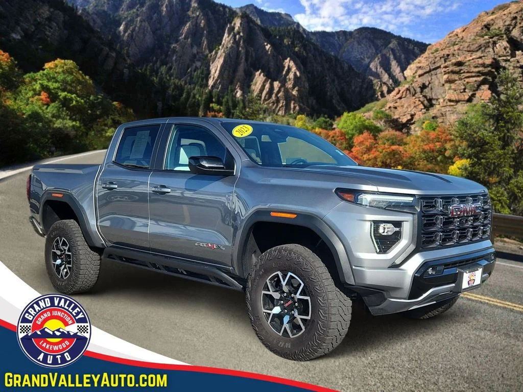Used 2023 Silver GMC AT4X image 1