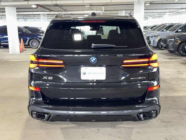 New 2026 Black Sapphire Metallic BMW xDrive50e image 6