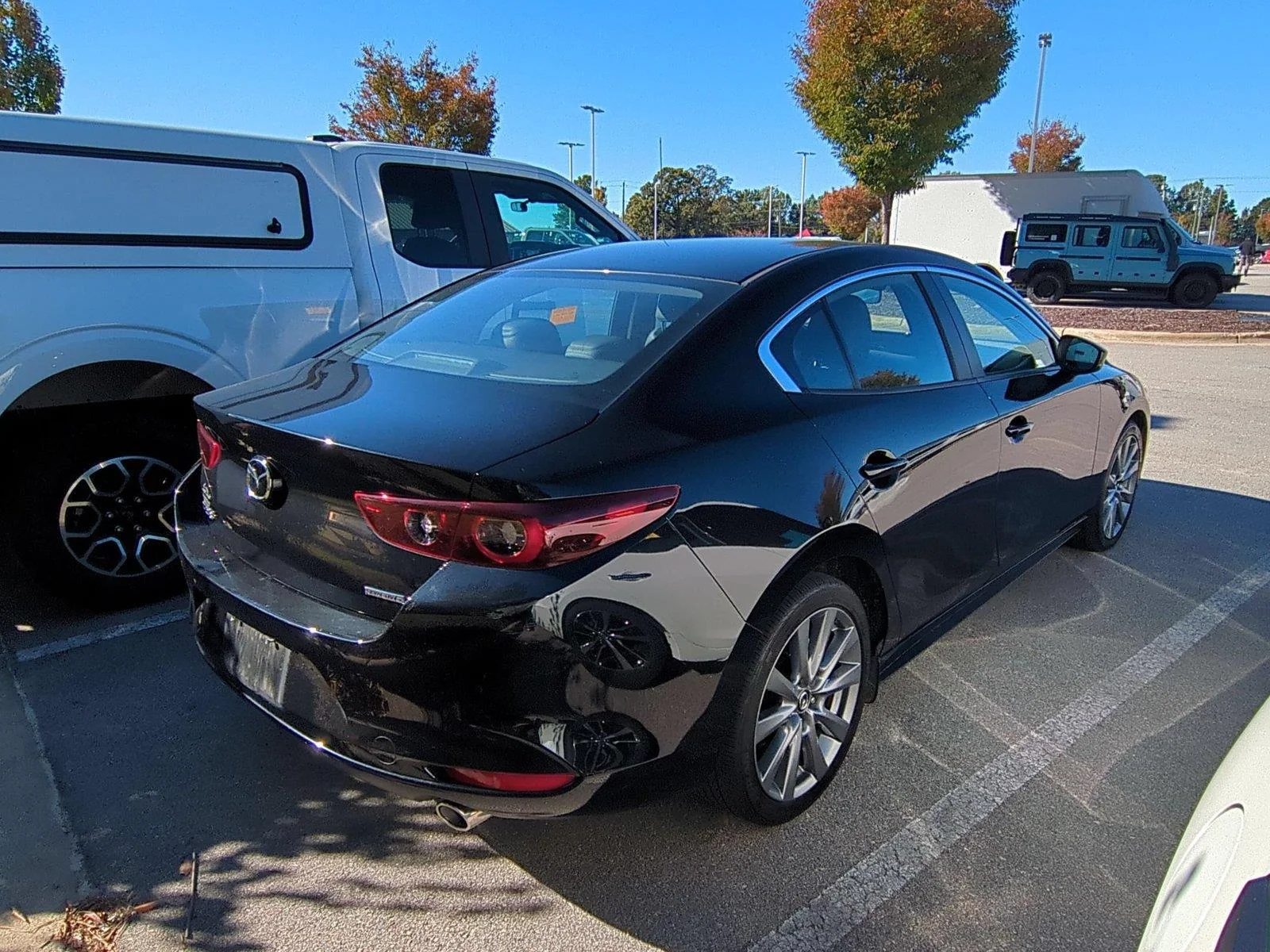 Used 2024 JET BLACK MICA MAZDA PREF image 4