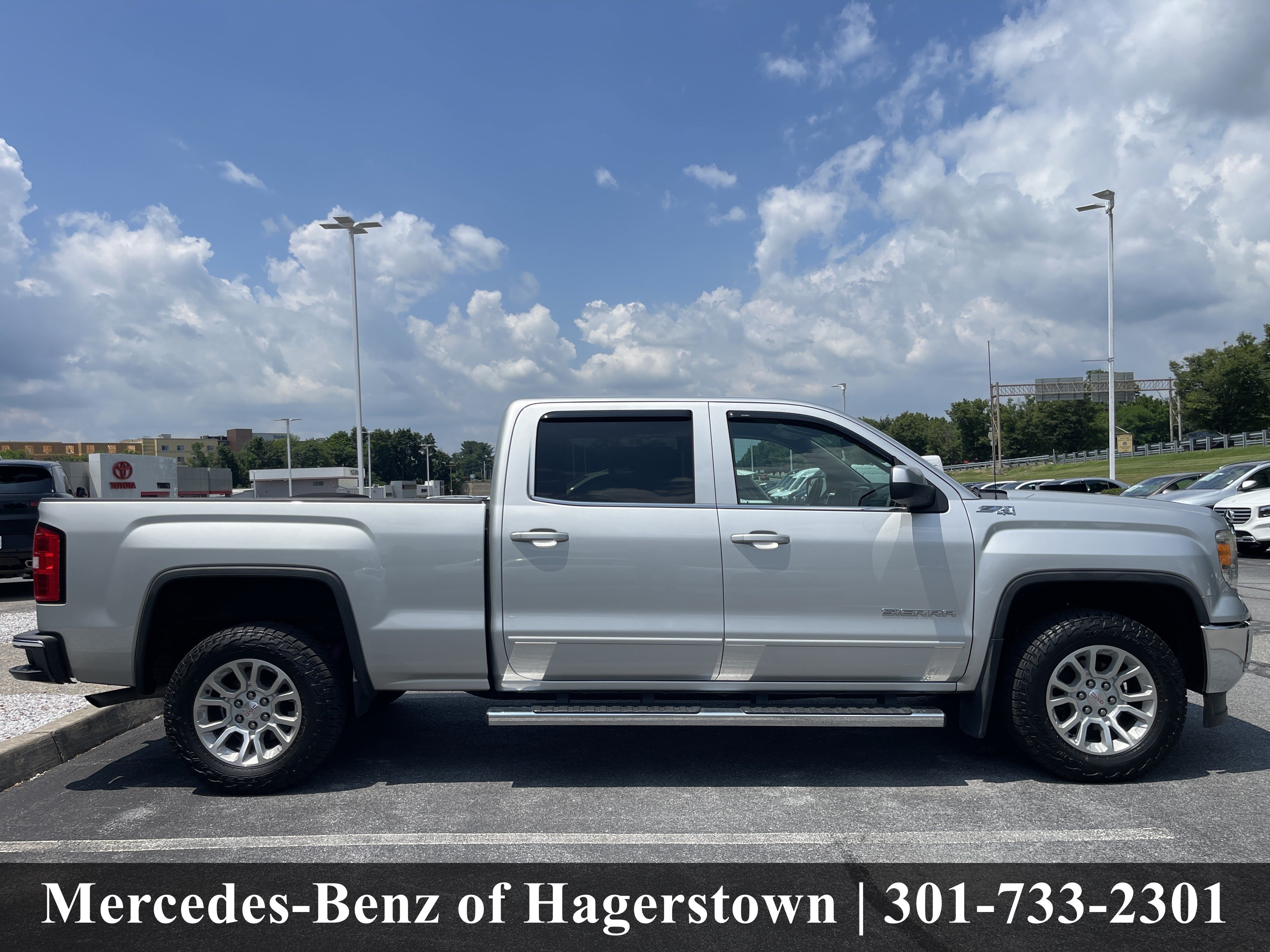 Used 2015 Quicksilver Metallic GMC SLE 4WD Crew Cab 153.0 image 34