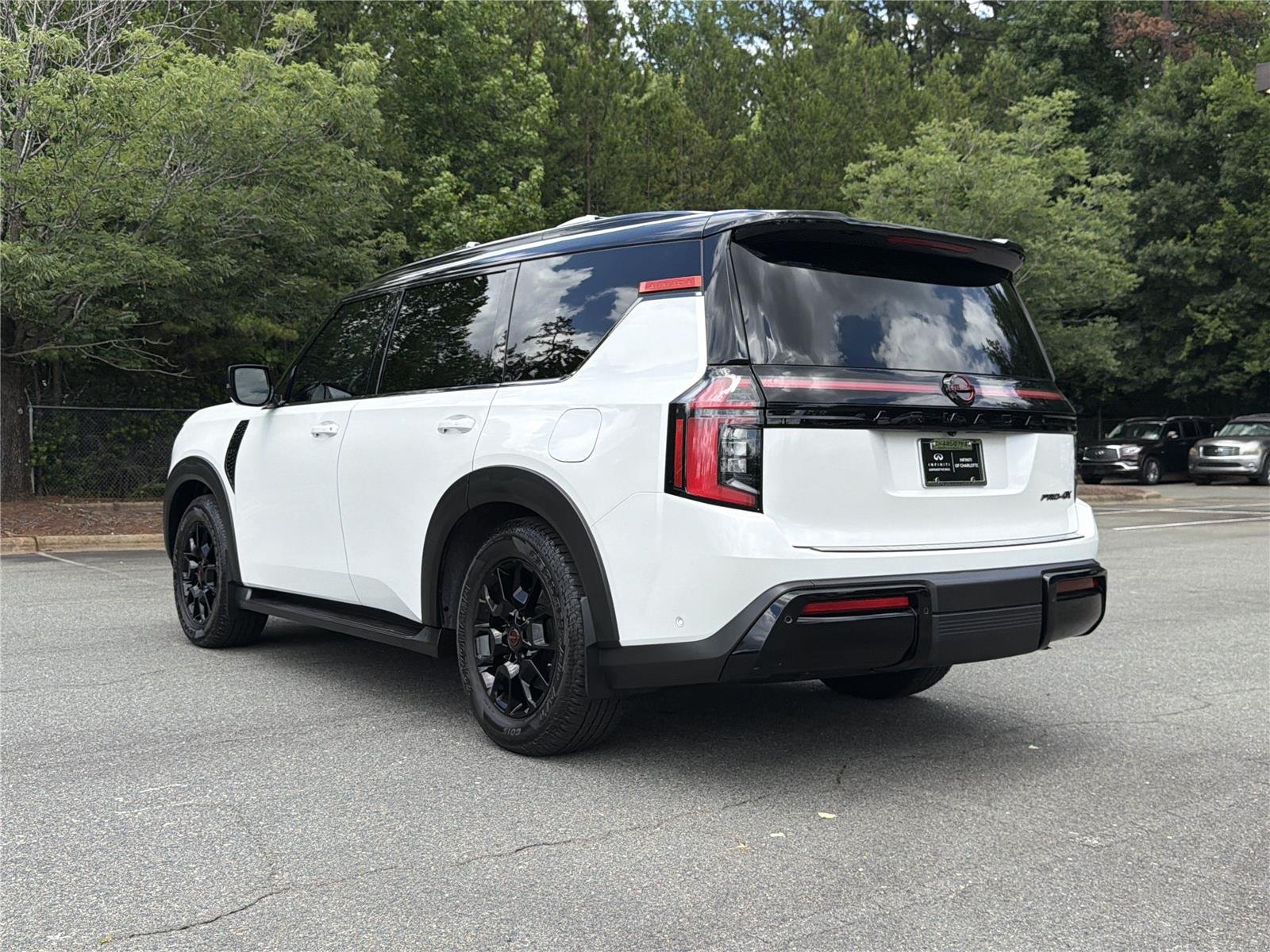 Used 2025 Aspen White Tricoat/Super Black Nissan PRO-4X image 22