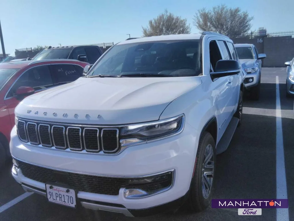 Used 2024 Bright White Clearcoat Jeep Series II image 1