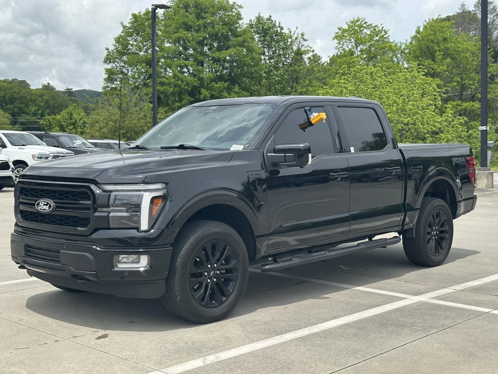 Used 2024 Agate Black Metallic Ford LARIAT image 3