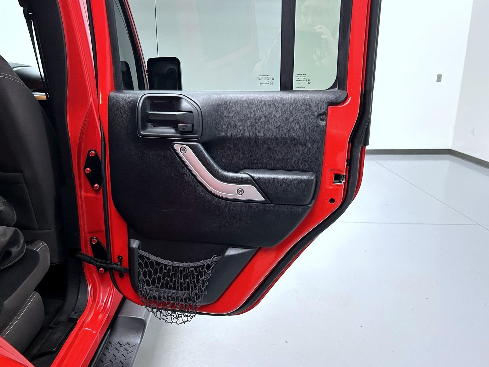 Used 2016 Red Jeep Unlimited Sahara image 17