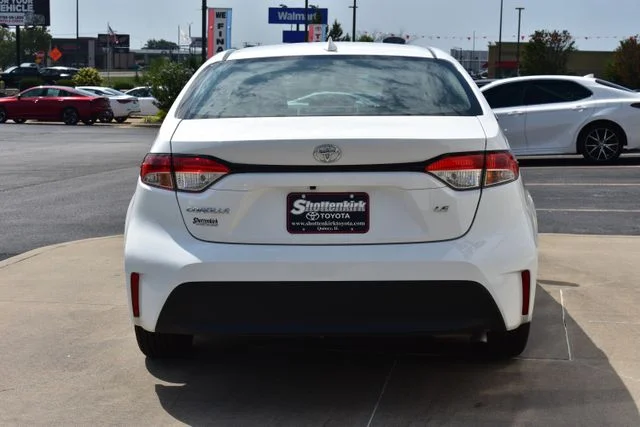 Used 2024 White Toyota LE image 6