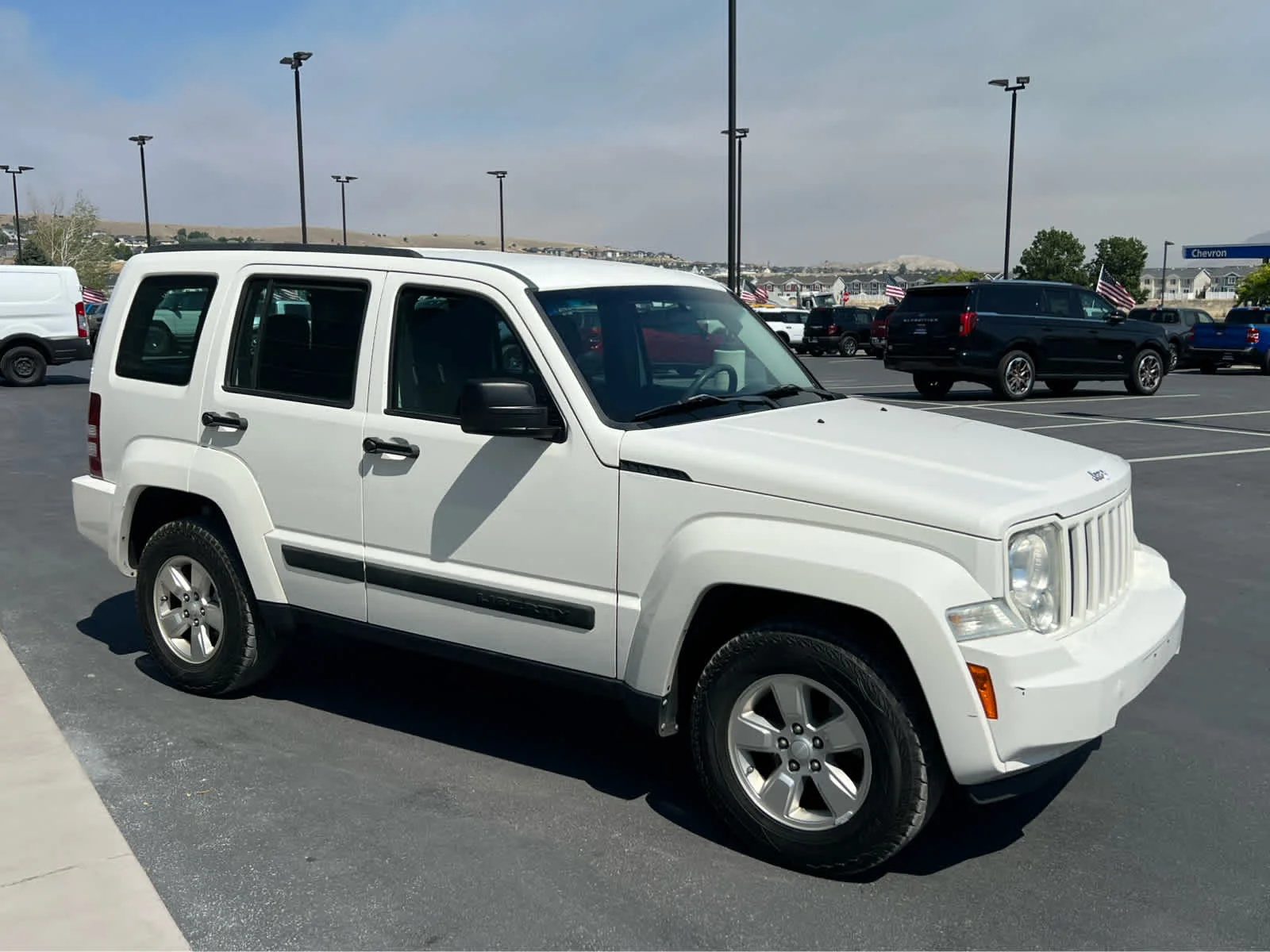 Used 2010 Stone White Clearcoat Jeep Sport image 5
