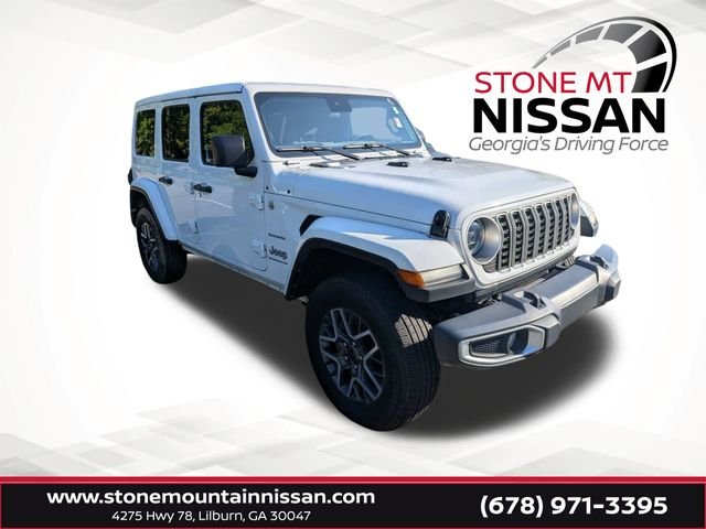 Used 2024 White Jeep Sahara image 1