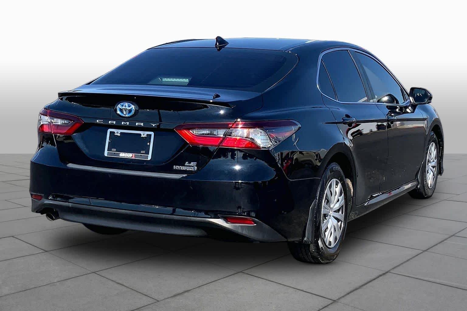 Used 2023 Midnight Black Metallic Toyota Hybrid LE image 13