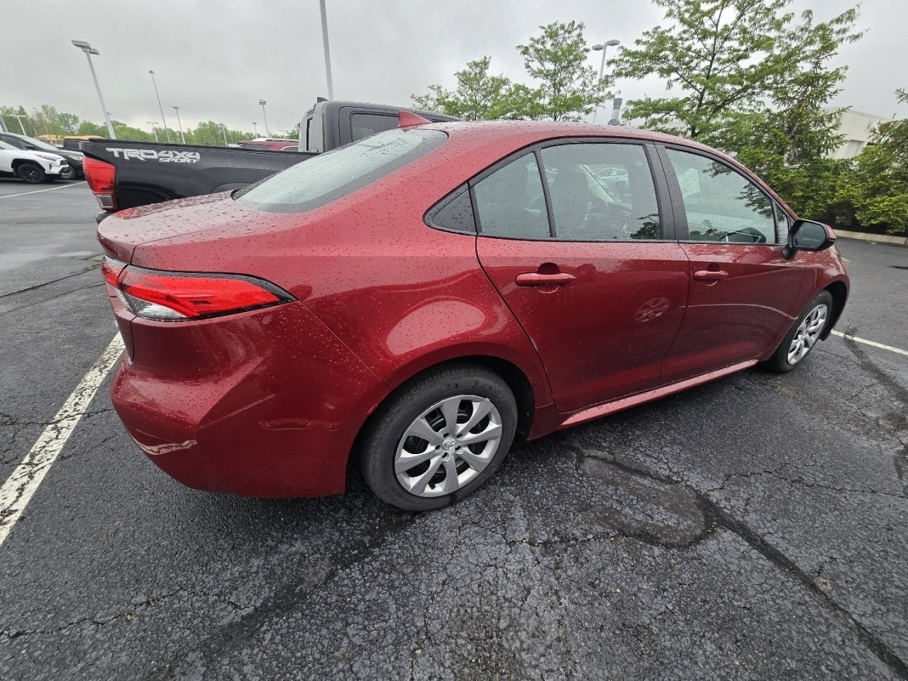 Certified Used 2025 Red Toyota LE image 8
