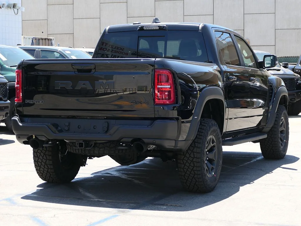 New 2026 Diamond Black Crystal Pearl Coat RAM RHO Crew Cab 4x4 5