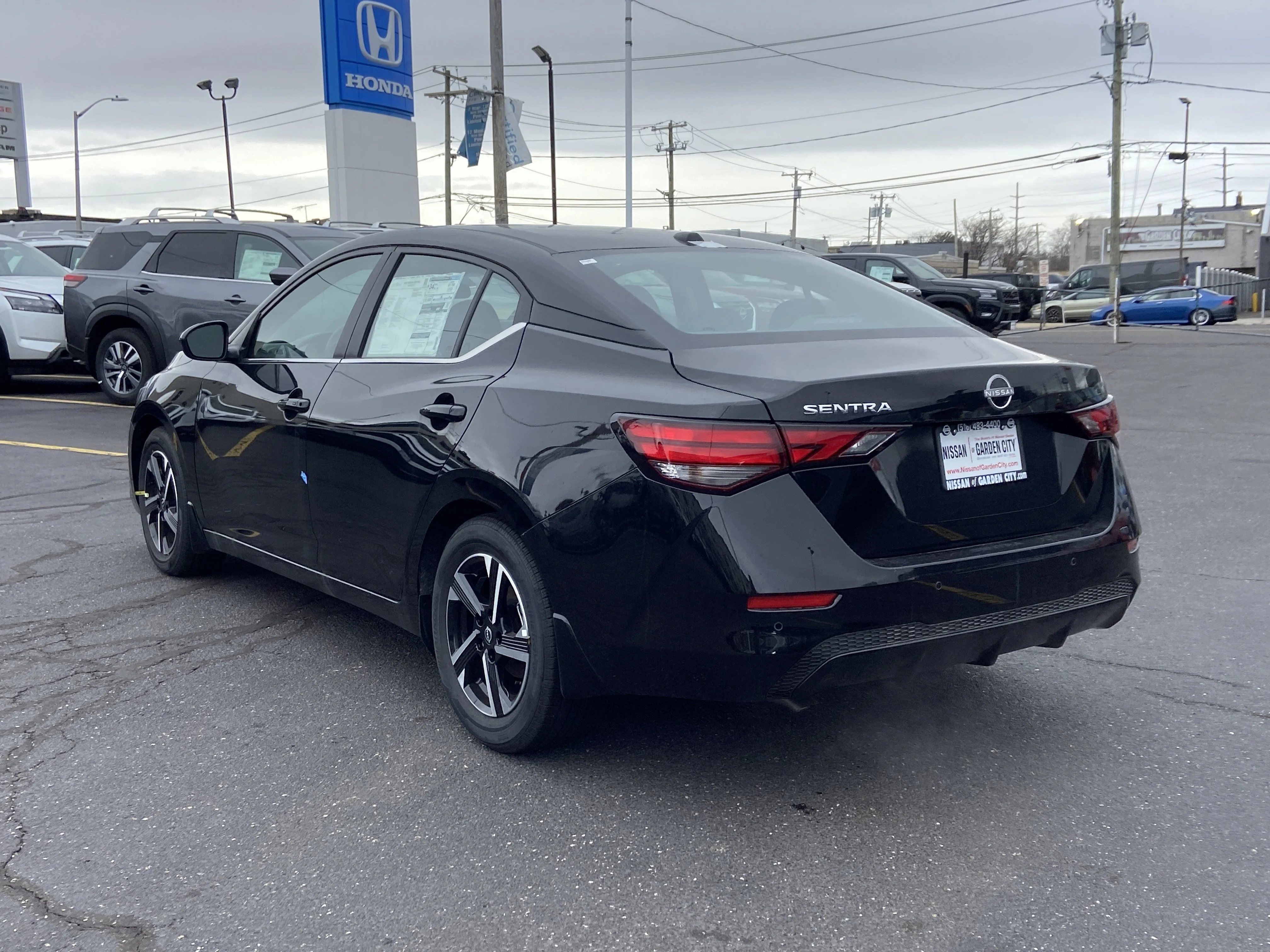 New 2025 Super Black Nissan SV image 6