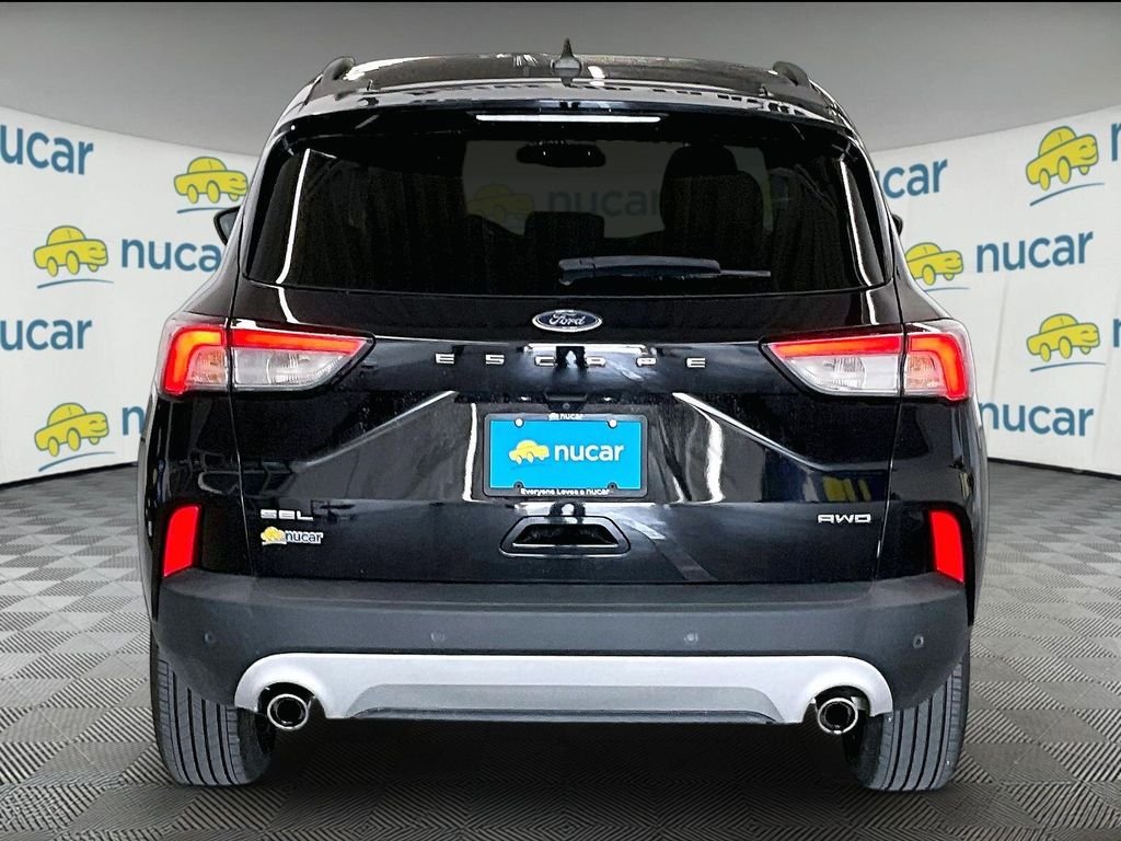 Used 2022 Black Metallic Ford SEL image 5
