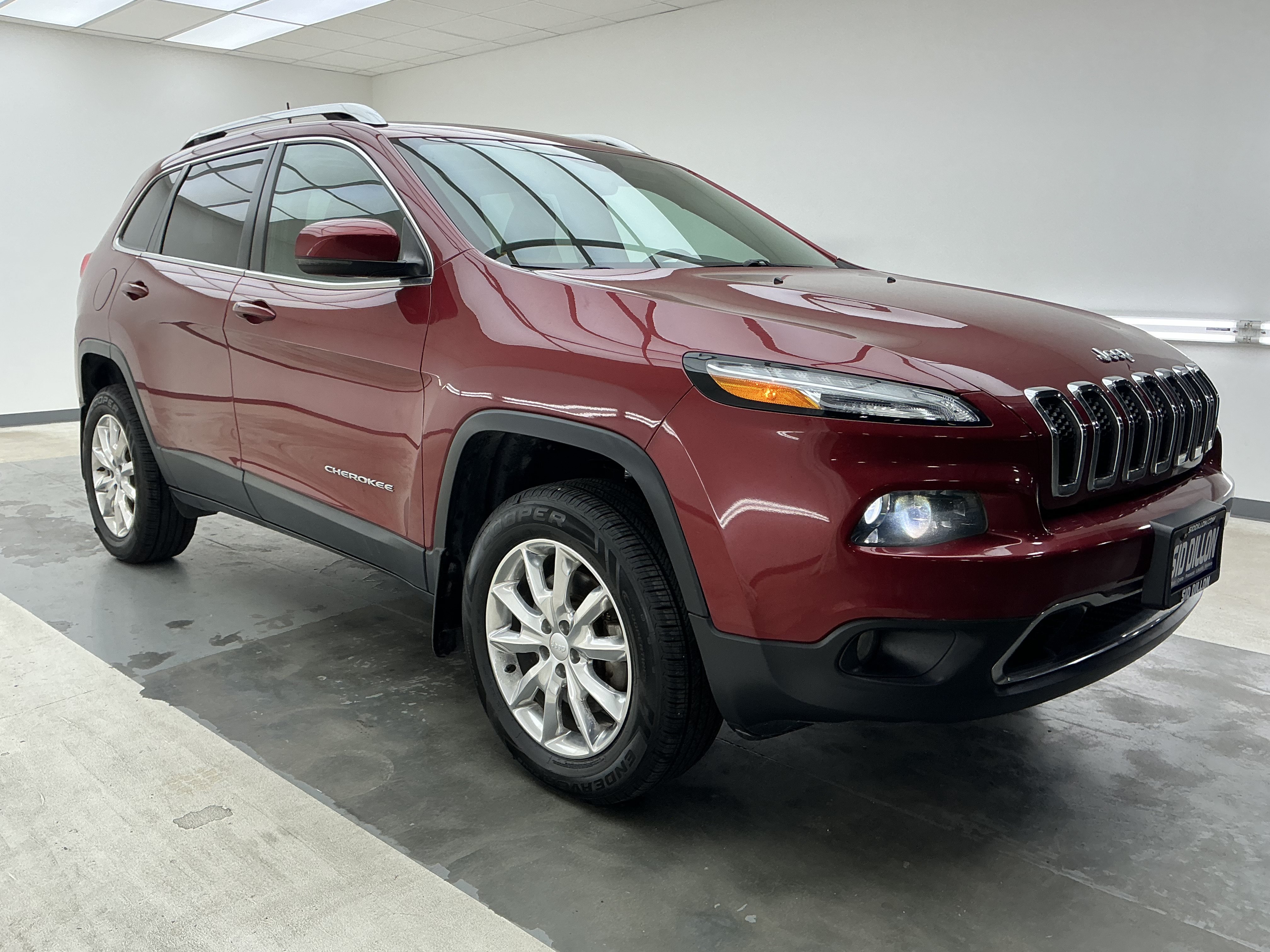 Used 2017 Deep Cherry Red Crystal Pearlcoat Jeep Limited image 3