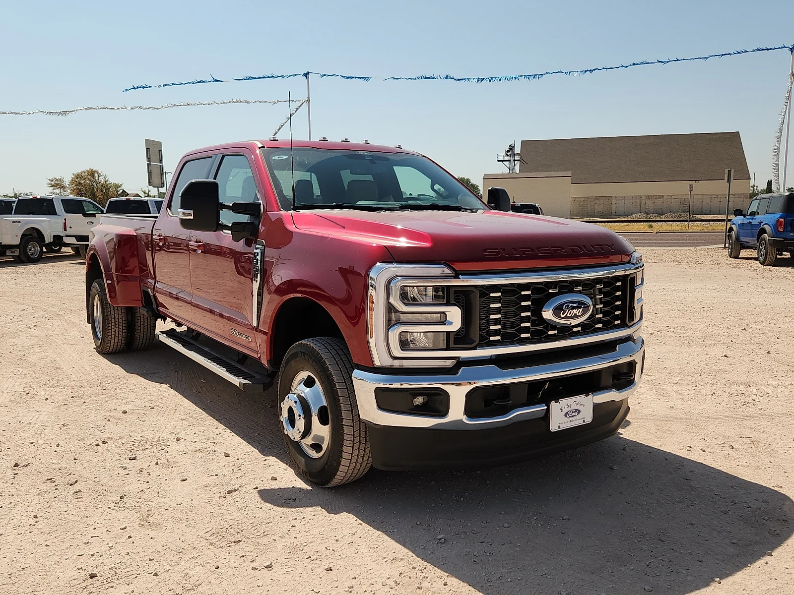 New 2026 Ruby Red Metallic Tinted Clearcoat Ford Lariat image 1