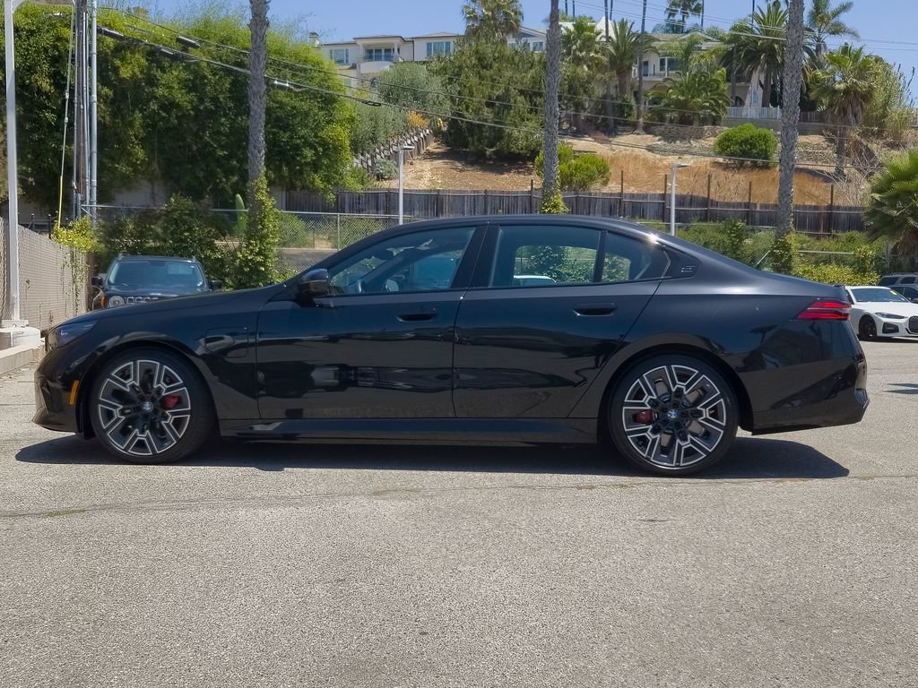 Used 2026 Black Sapphire Metallic BMW 550e xDrive image 24