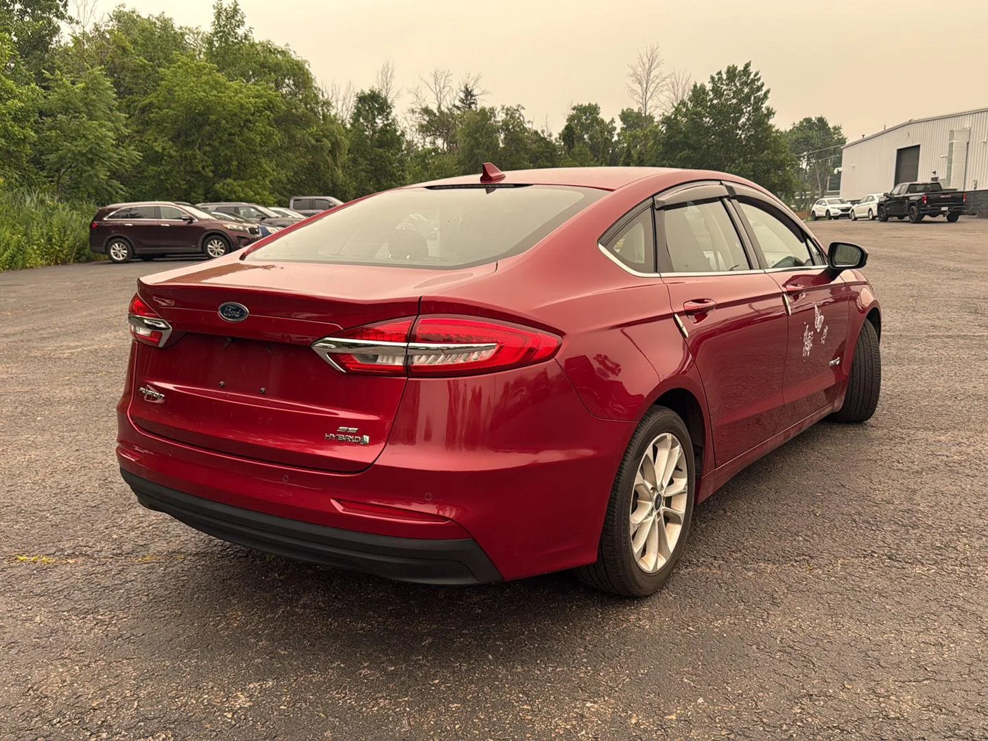 Used 2019 Ruby Red Metallic Tinted Clearcoat Ford SE image 9