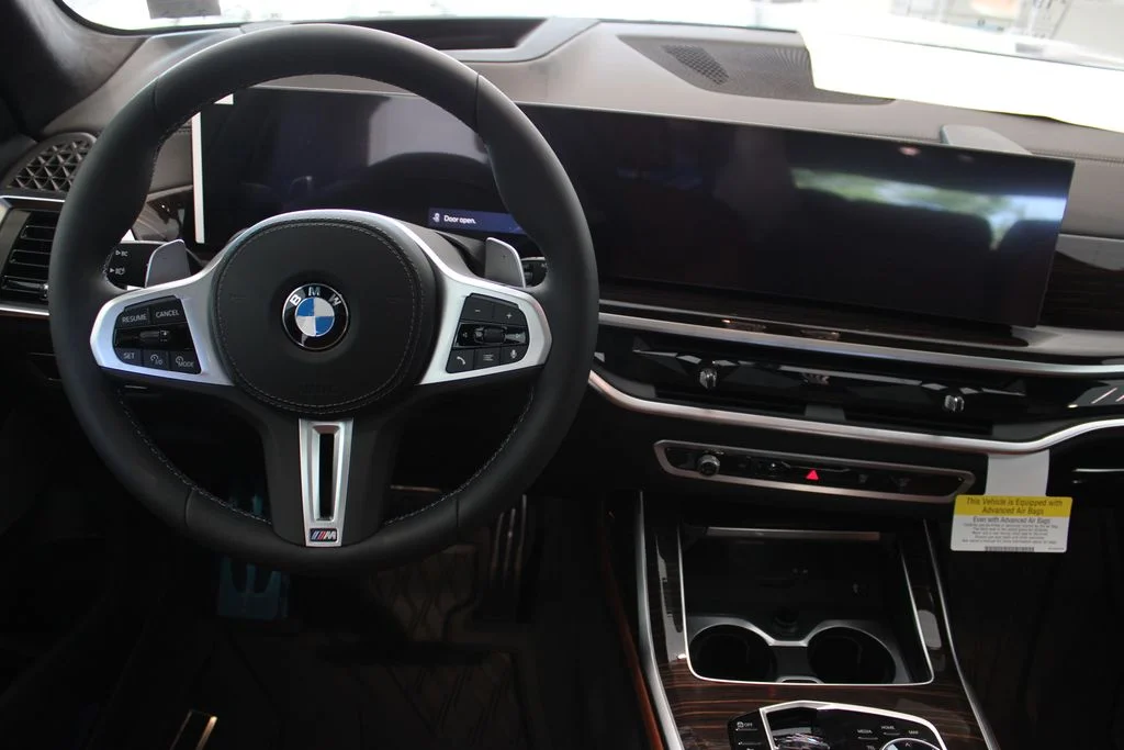 New 2027 Black Sapphire Metallic BMW M60i image 5