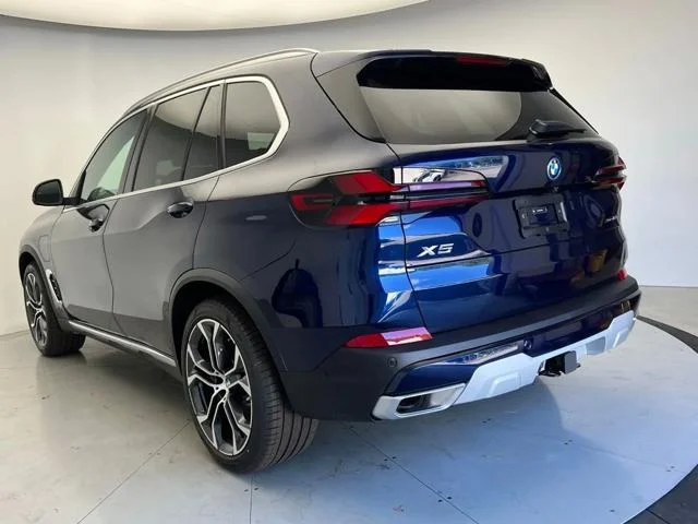 New 2026 Tanzanite Blue II Metallic BMW xDrive50e image 4