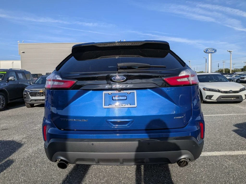 Certified Used 2024 Blue Metallic Ford Titanium image 4