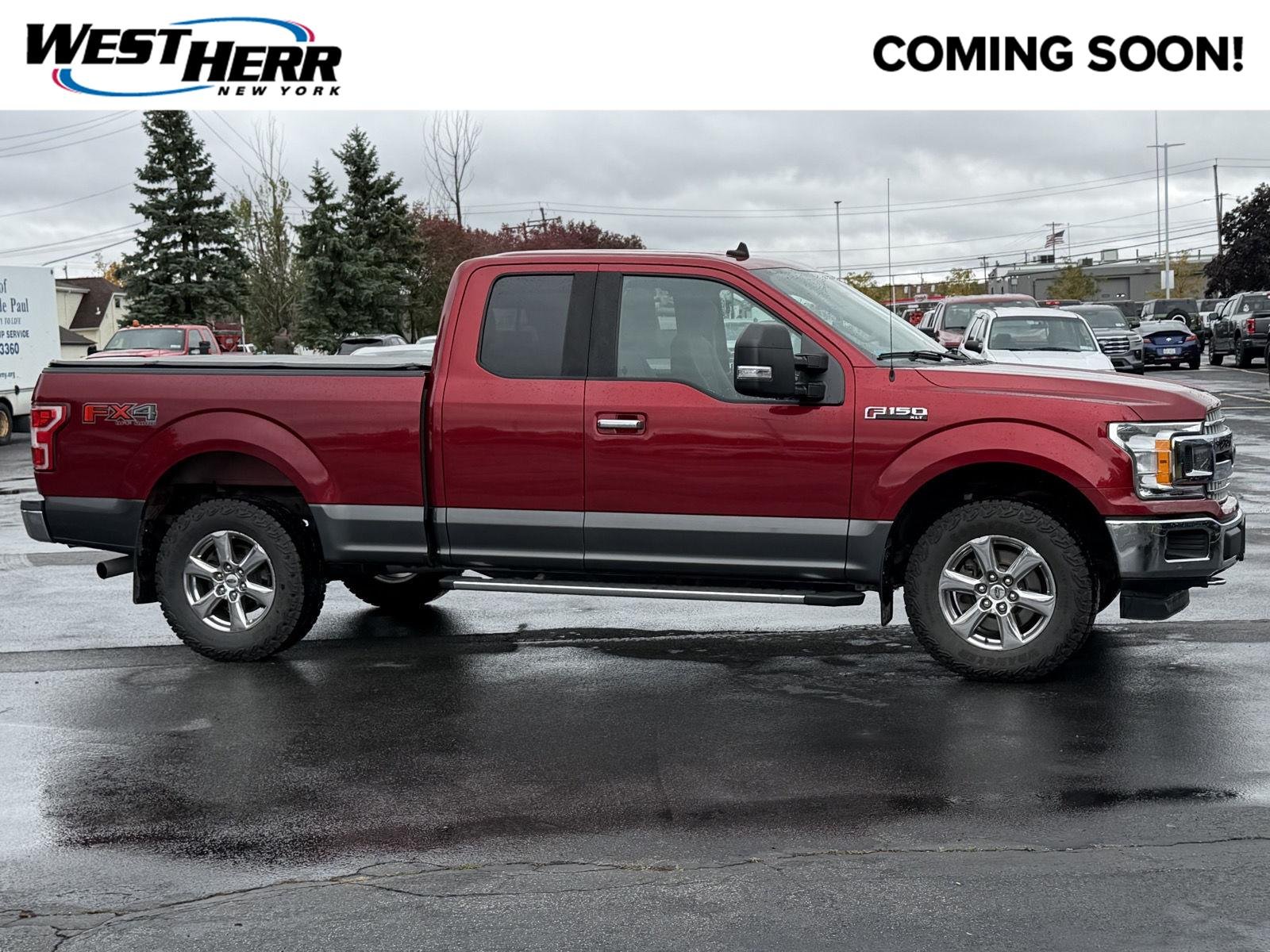 Used 2019 Ruby Red Metallic Tinted Clearcoat/Magnetic Ford XLT image 1