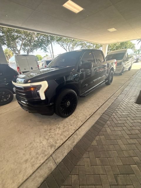 Used 2024 Ford F-150 Lightning Lariat with VIN 1FT6W5L78RWG20992 for sale in Naples, FL