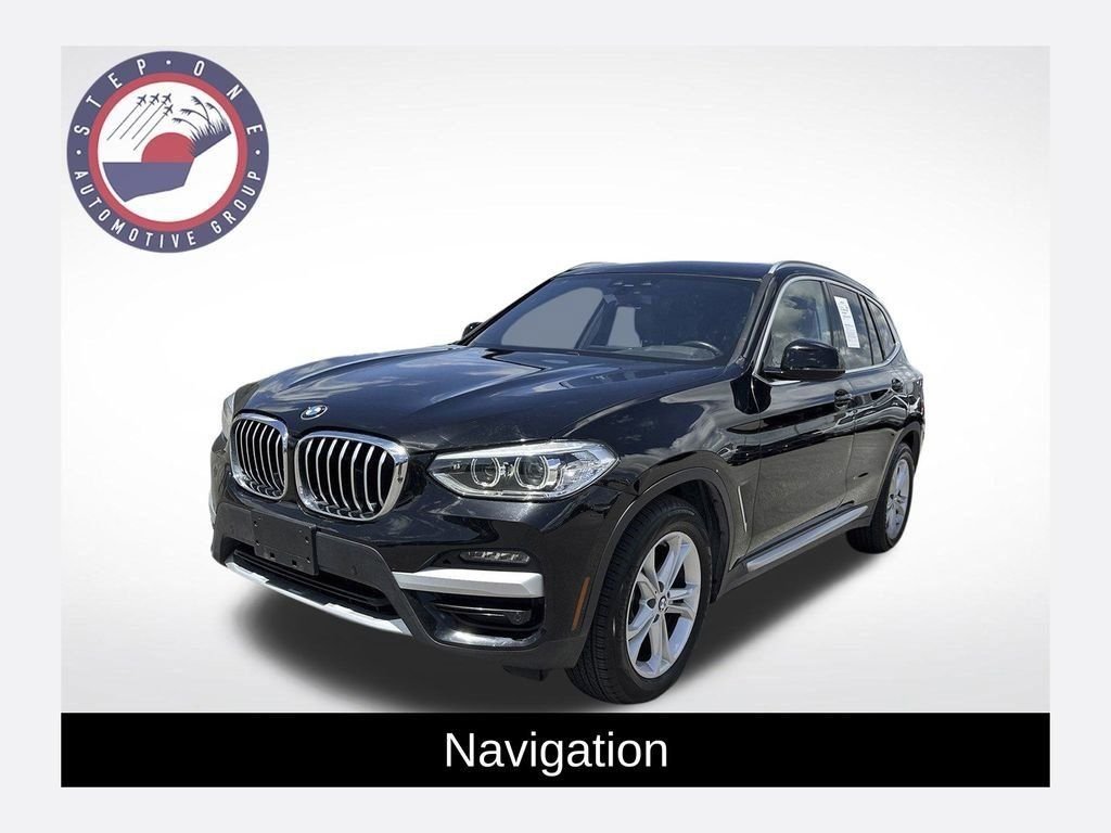 Used 2021 Black BMW sDrive30i image 1