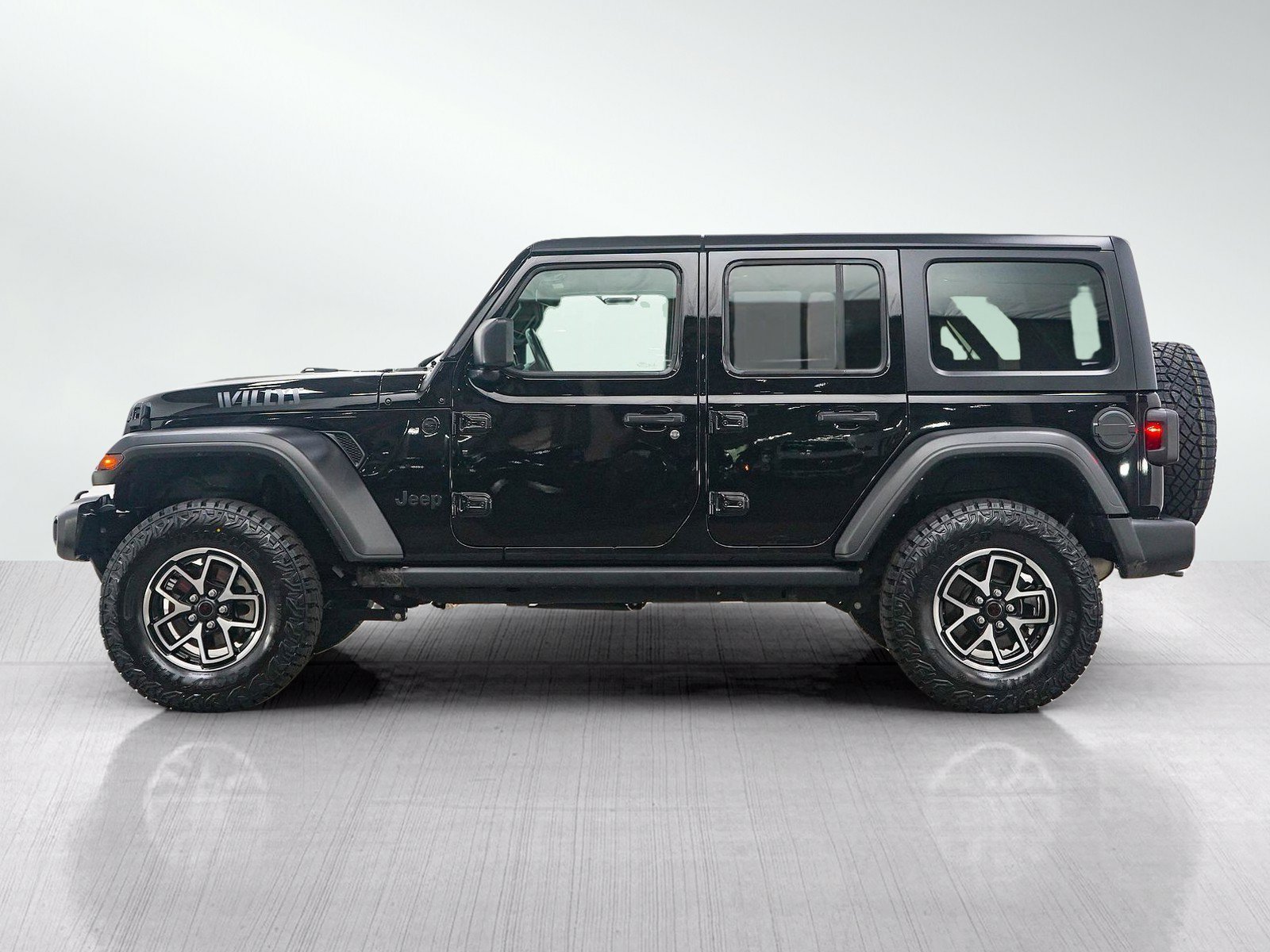 Used 2021 Jeep Wrangler Unlimited Willys with VIN 1C4HJXDGXMW743395 for sale in Burnsville, Minnesota