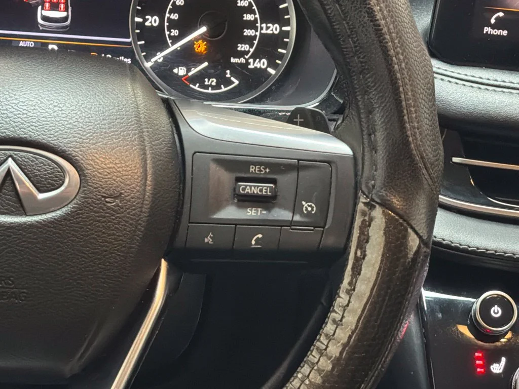 Used 2024 Mineral Black INFINITI PURE image 19