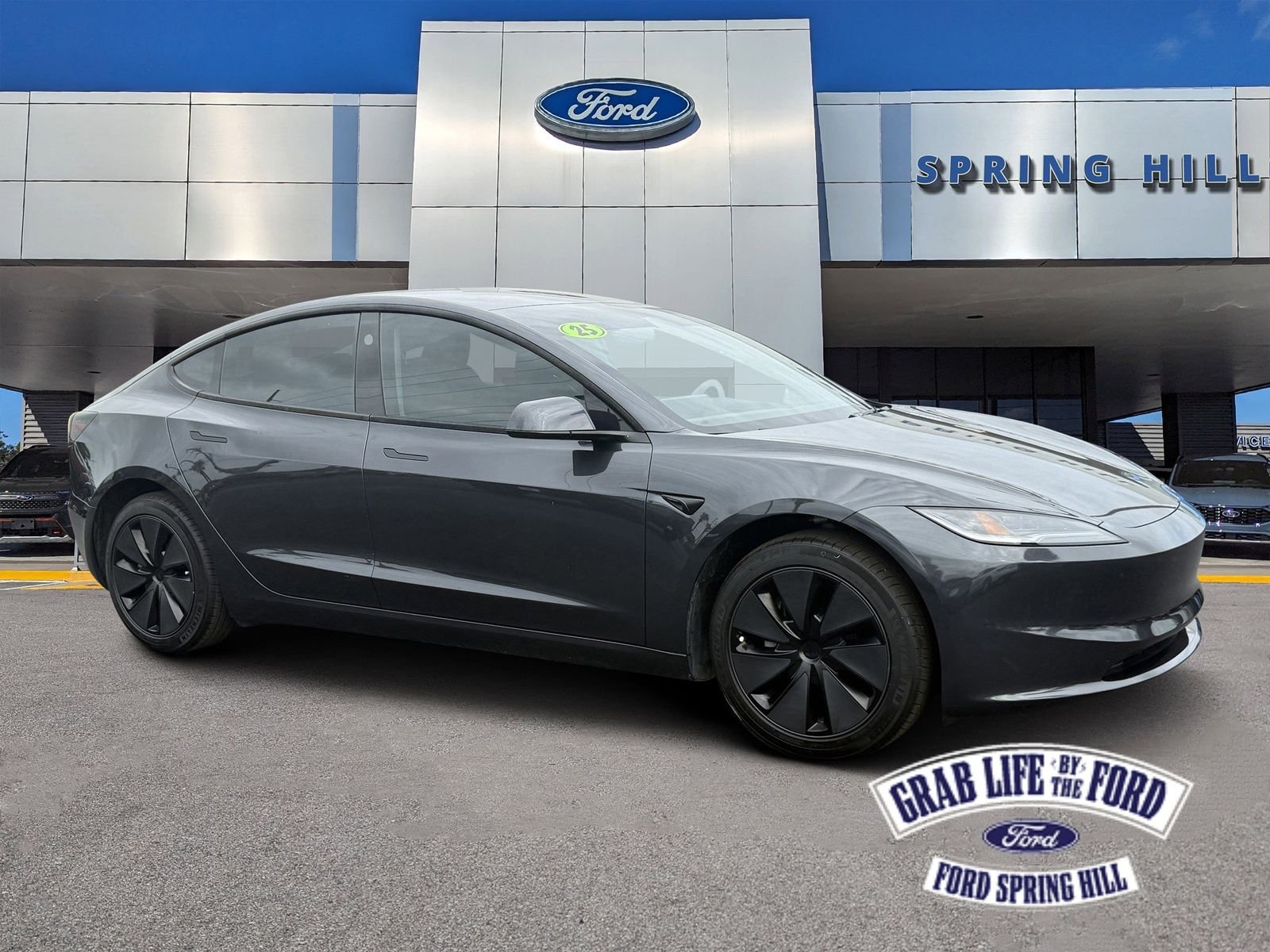 Used 2025 Stealth Gray Tesla Long Range image 1