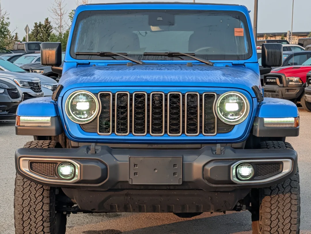 Used 2024 Blue Jeep Sahara - - 4x4 - Leather Seats - Power Soft Top - Remote Start & More! image 3