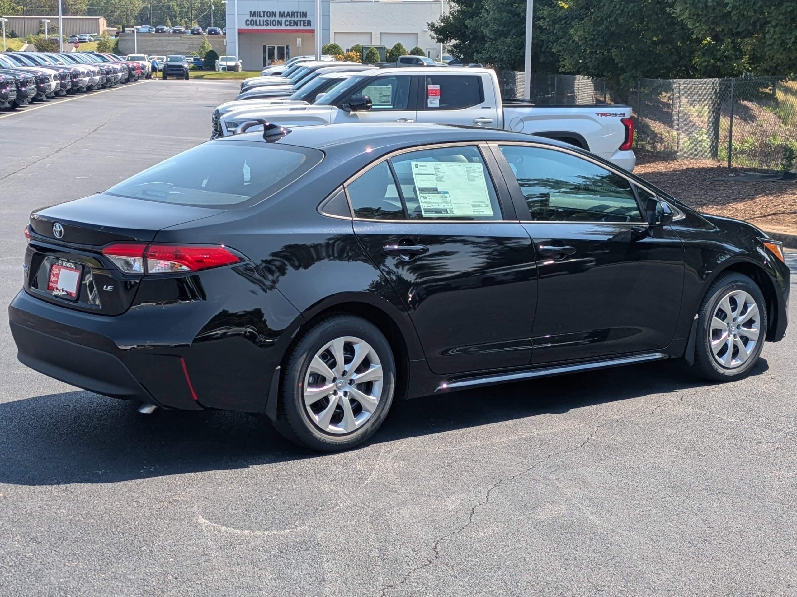 New 2026 Black Toyota LE image 4