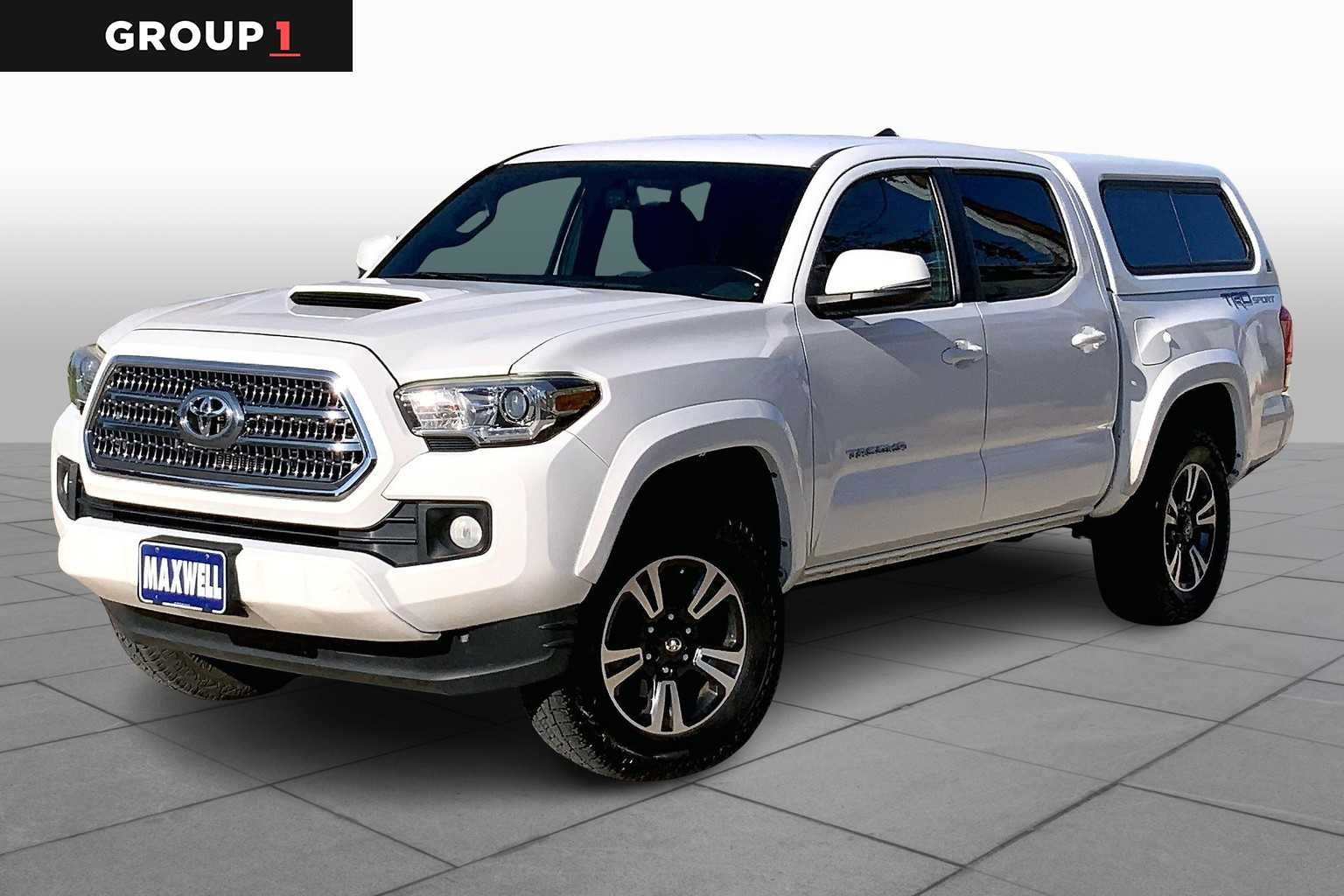 Used 2016 Super White Toyota TRD Sport image 1