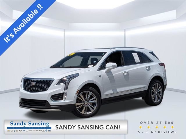 Used 2024 White Cadillac Premium Luxury image 1