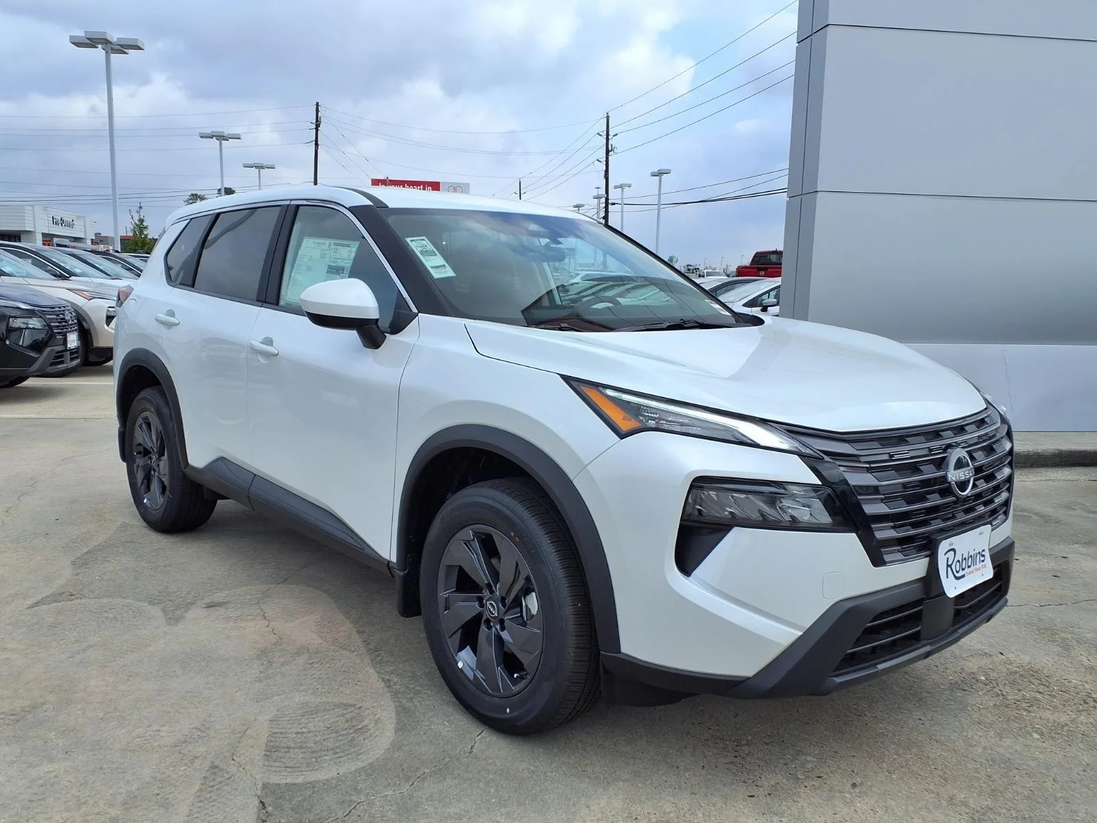 2026 Nissan Rogue SV White at Robbins Nissan