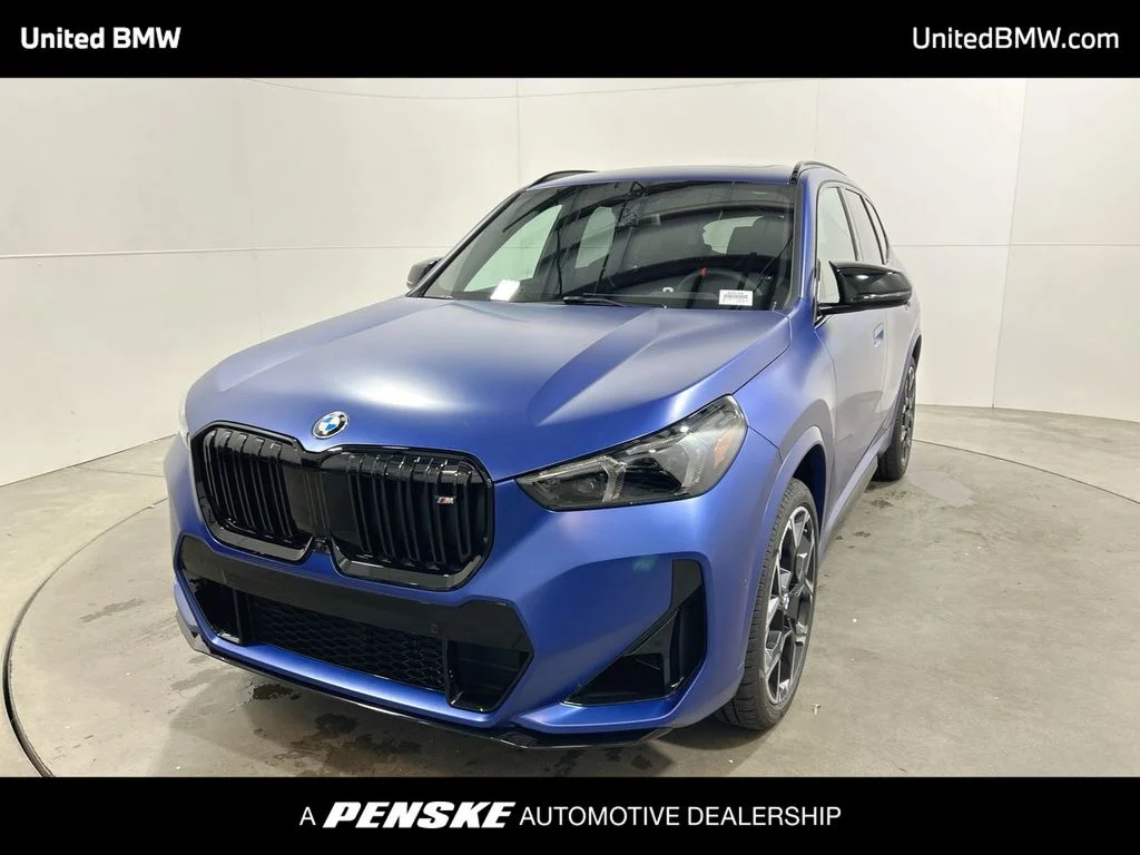 Used 2026 Frozen Portimao Blue II Metallic BMW M35i image 1