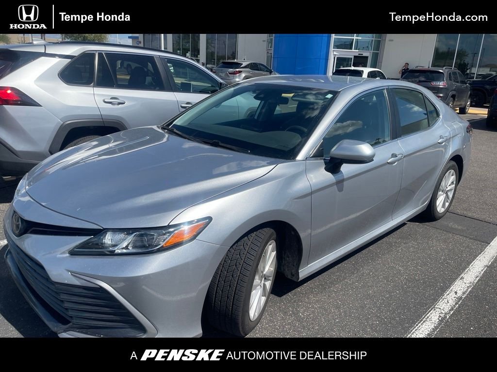 Used 2023 Celestial Silver Metallic Toyota LE image 1