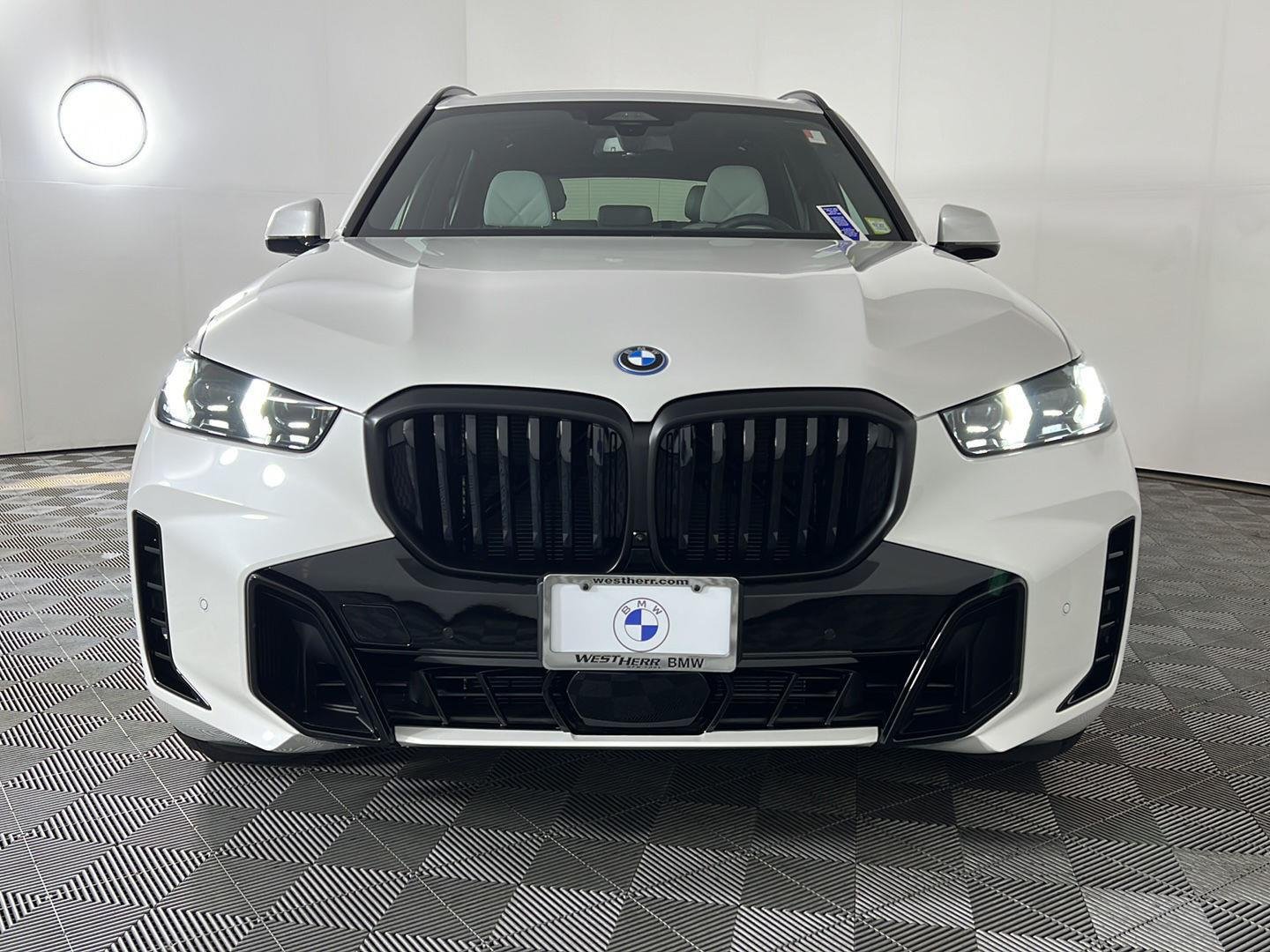 Used 2026 Mineral White Metallic BMW xDrive50e image 21