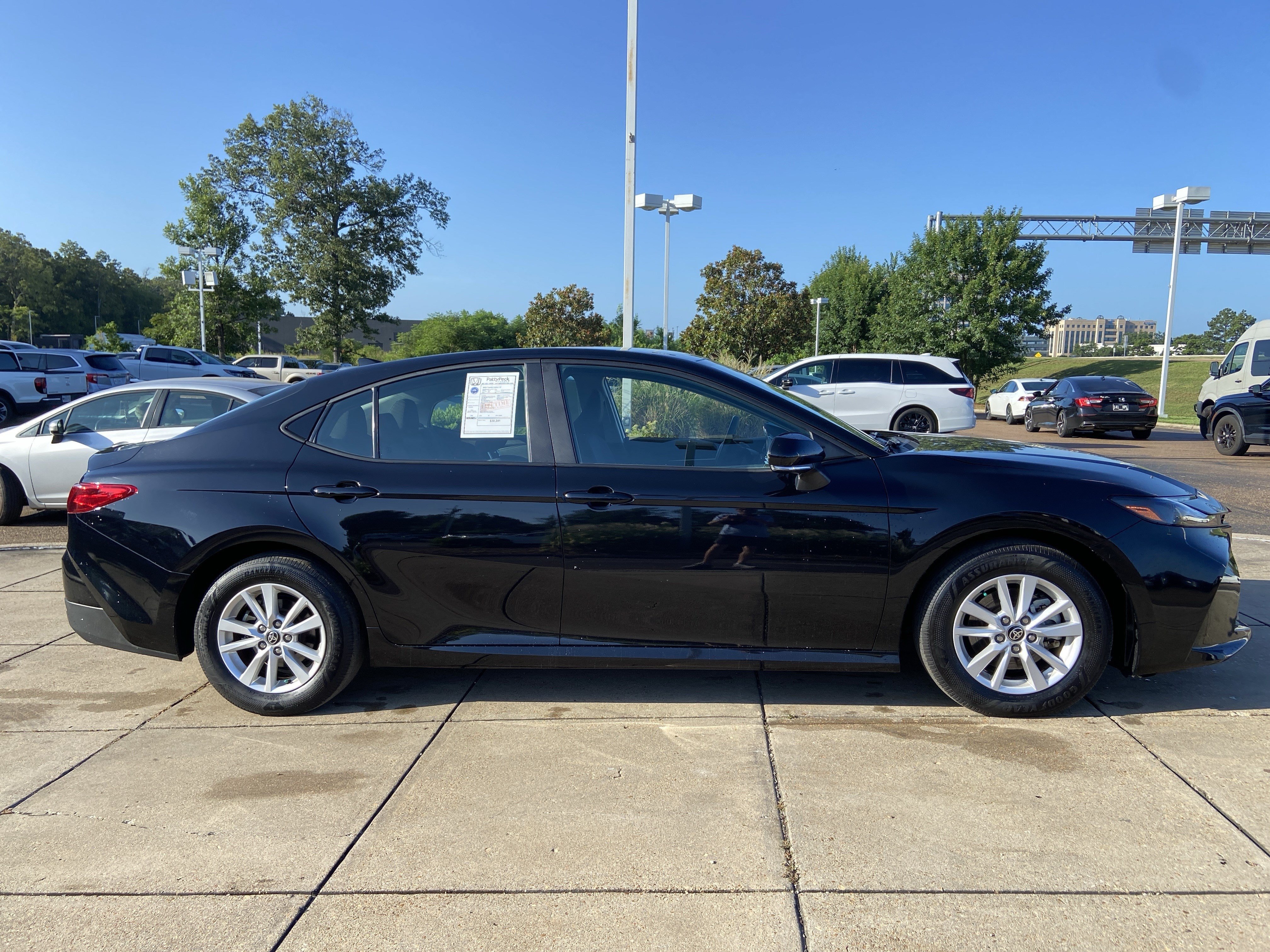 Used 2025 Midnight Black Metallic Toyota LE image 6