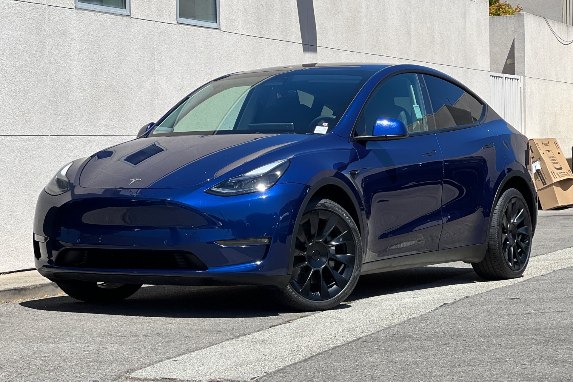 Used 2022 Deep Blue Metallic Tesla Long Range image 1