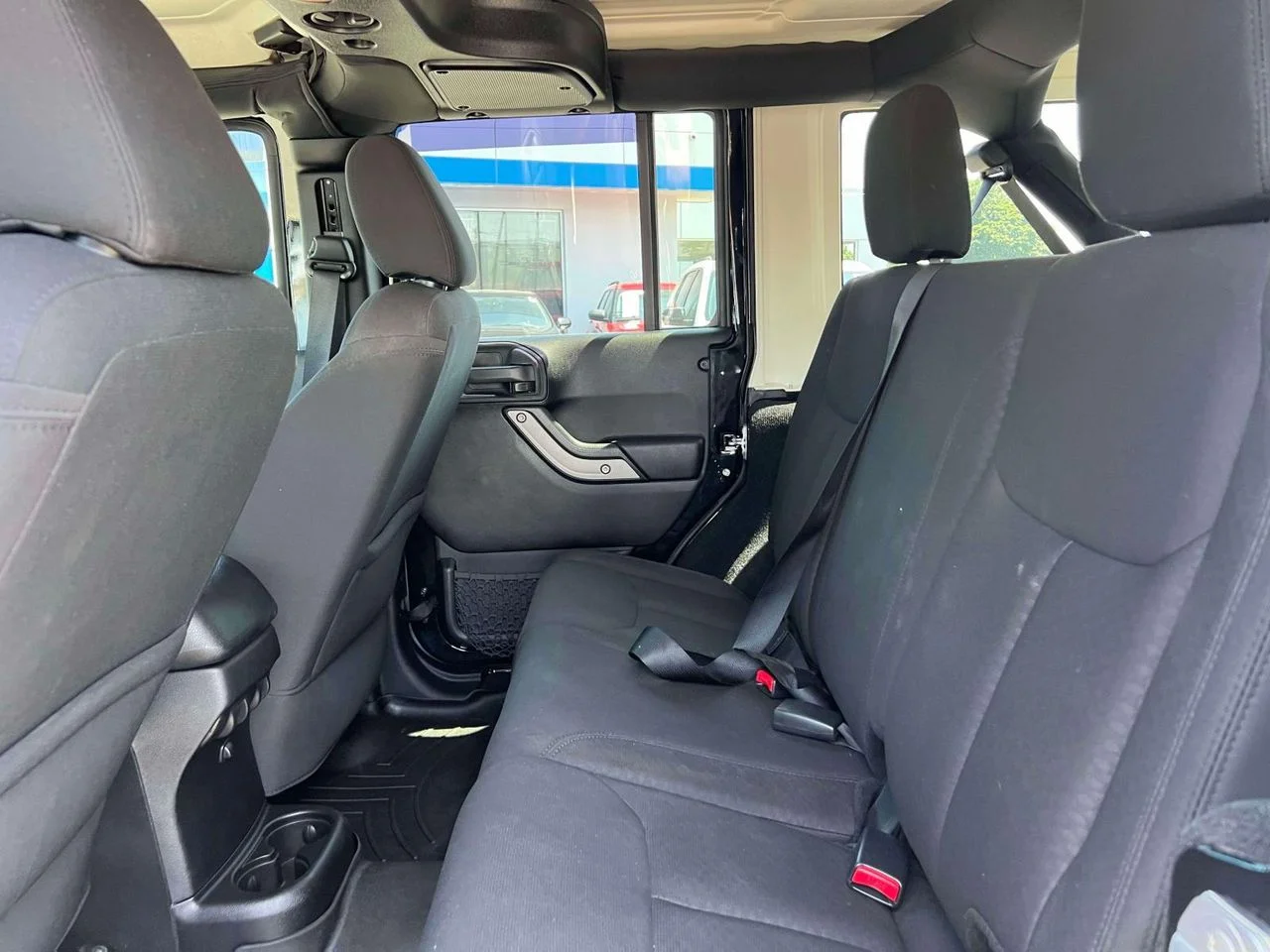 Used 2015 Black Clearcoat Jeep Sport image 13