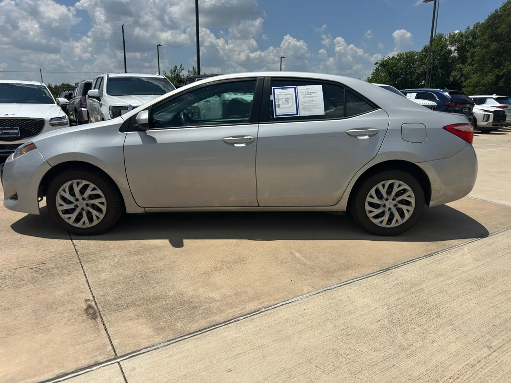 Used 2019 Classic Silver Metallic Toyota LE image 8